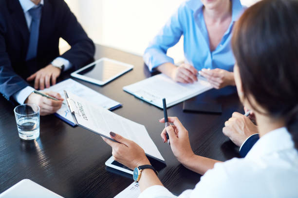 Company handling a board meeting to vote on a corporate contract.